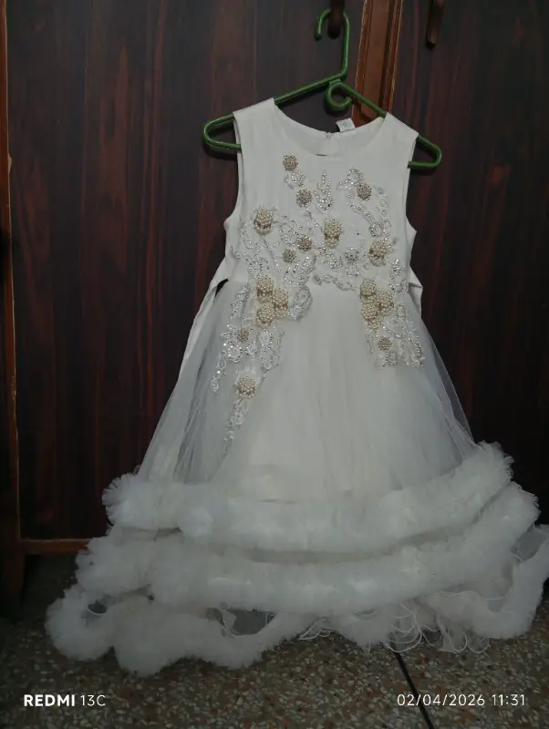Beautiful white fancy frock photo 2
