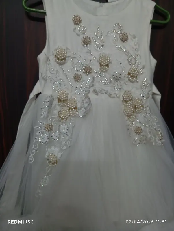 Beautiful white fancy frock photo 1