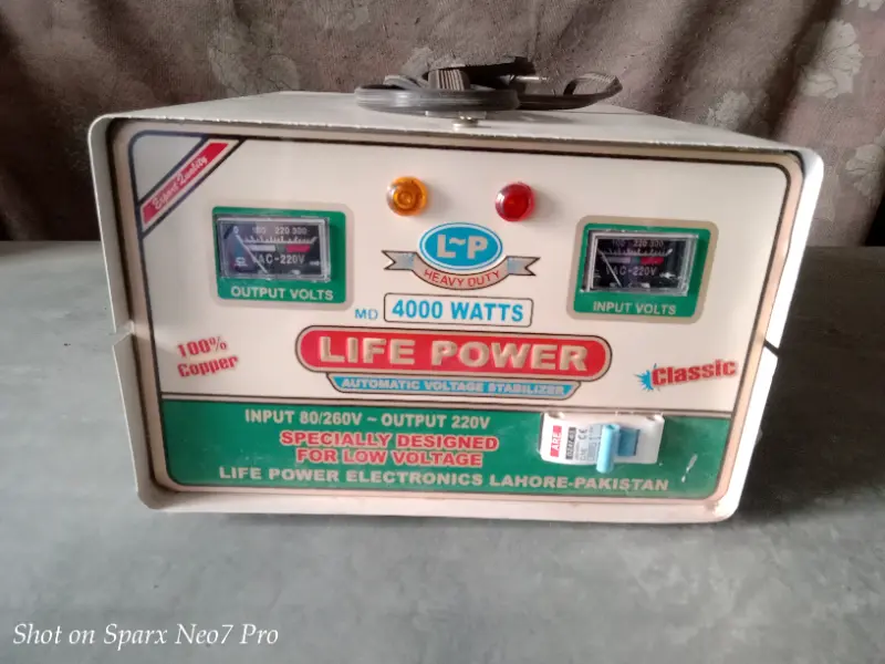 Unused stabilizer 4000 watts just need cash urgent sale only photo 1