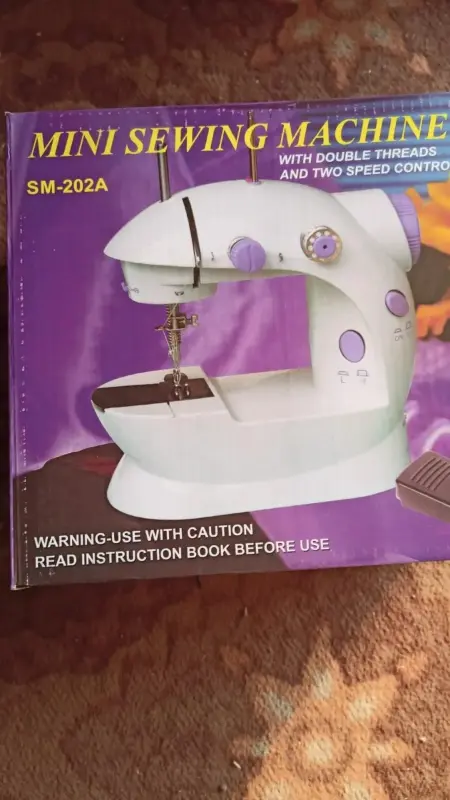 Electric Mini Sewing Machine photo 2